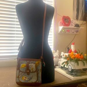 Dooney&Bourke crossbody purse. Never been used.